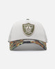 New Era Las Vegas Raiders "Camo Visor" 9FORTY A-Frame Trucker Snapback Stone/Olive