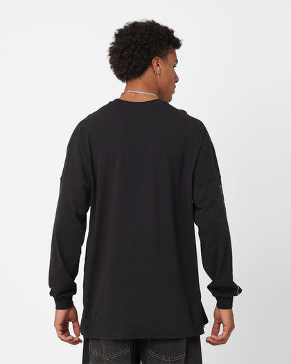 Majestic Athletic Las Vegas Raiders Checker Badge Long Sleeve T-Shirt Faded Black