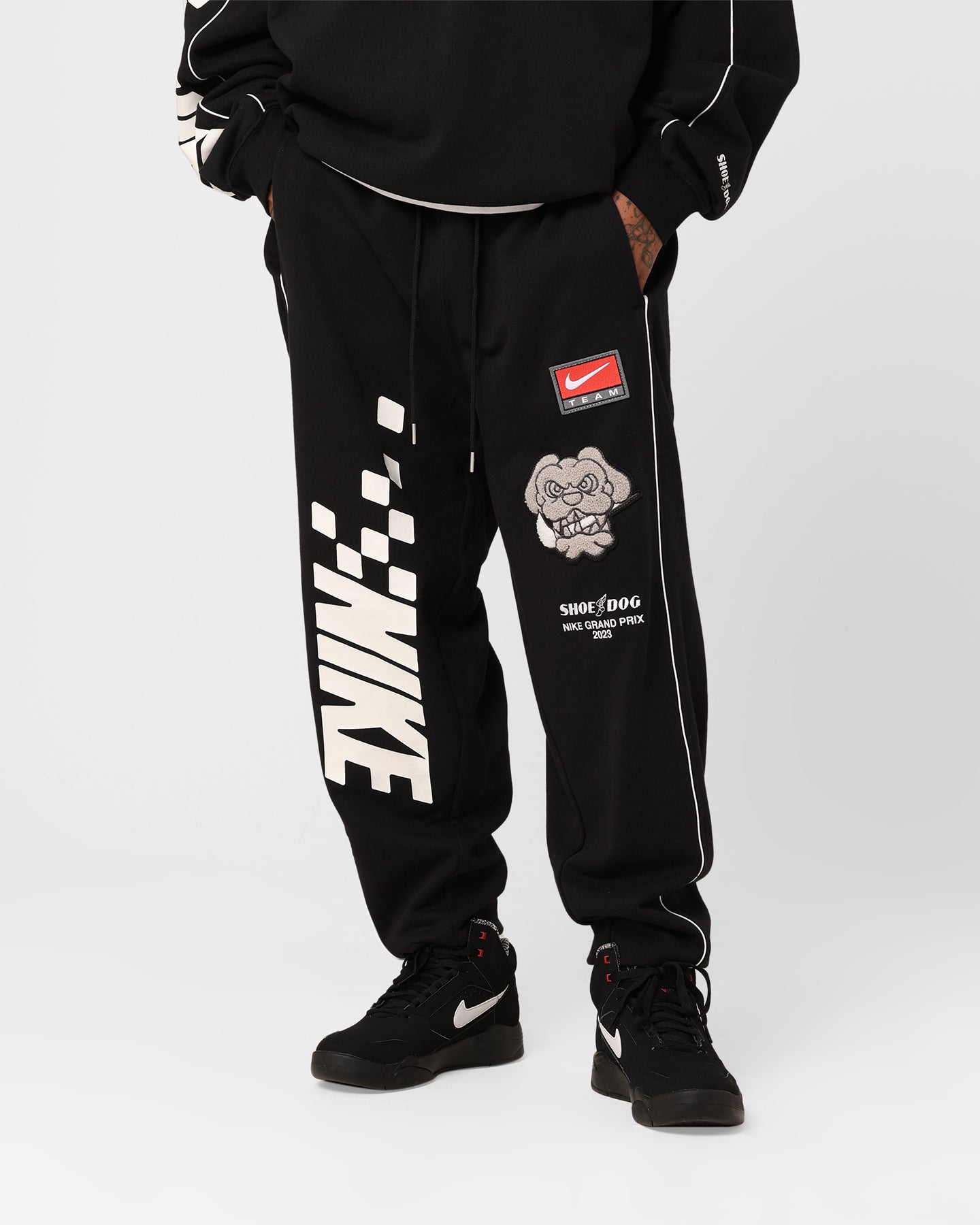 nike world tour track pants