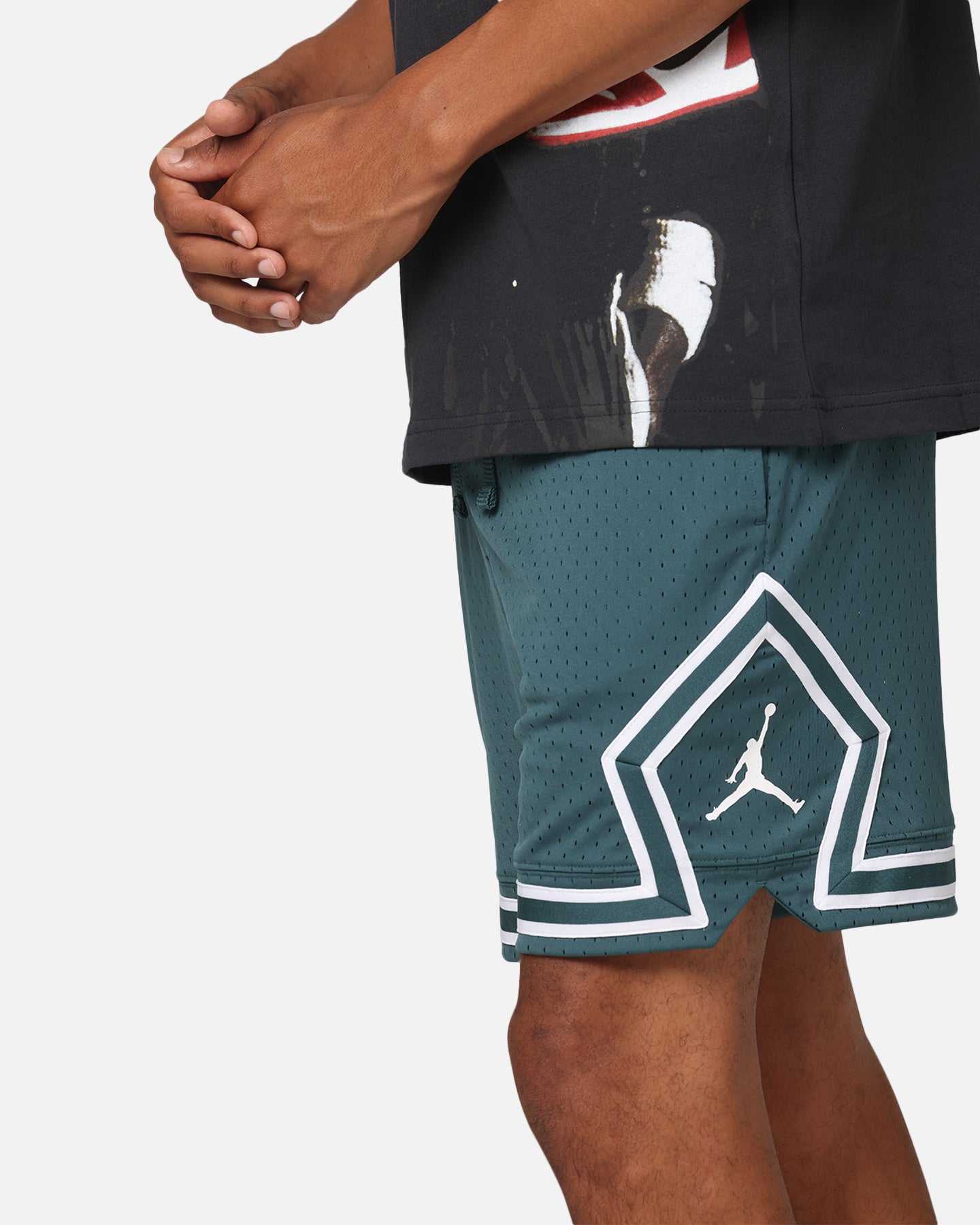 green and black jordan shorts