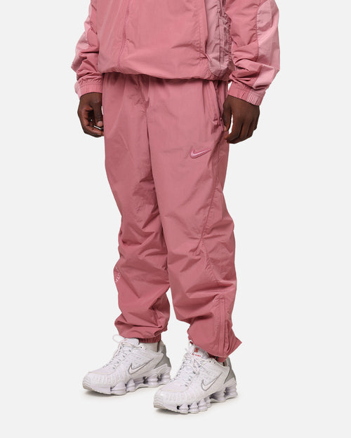 Nike Nocta Northstar Nylon Track Pants Desert Berry