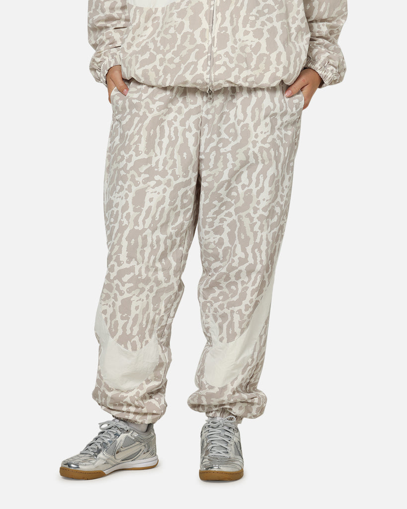 NikeWomen'sSportswearWovenPrintedPantsLeopard/White