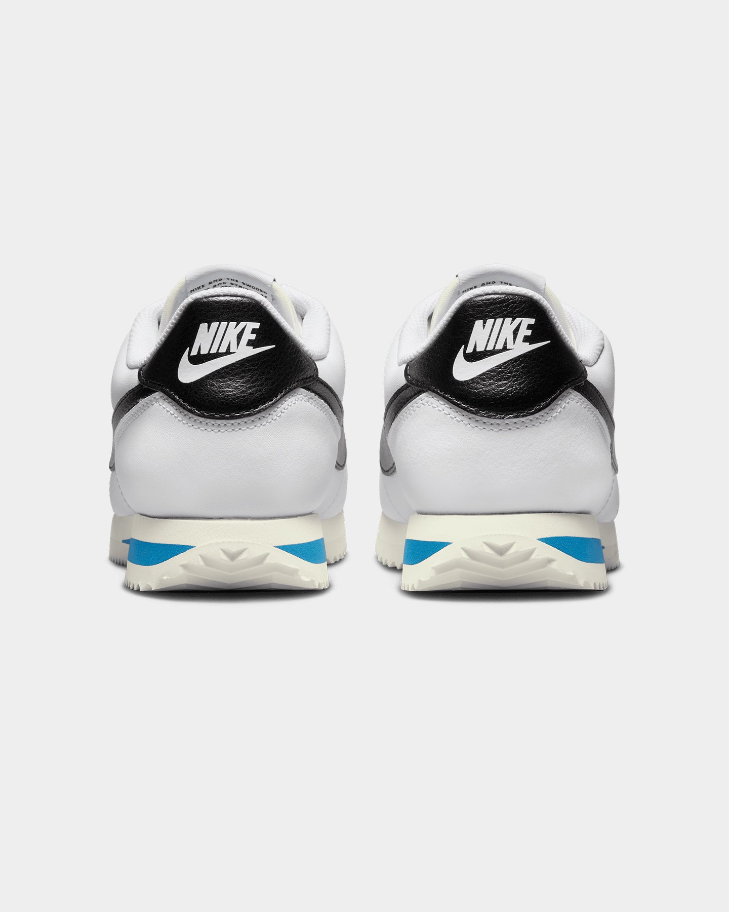 nike cortez womens white and black