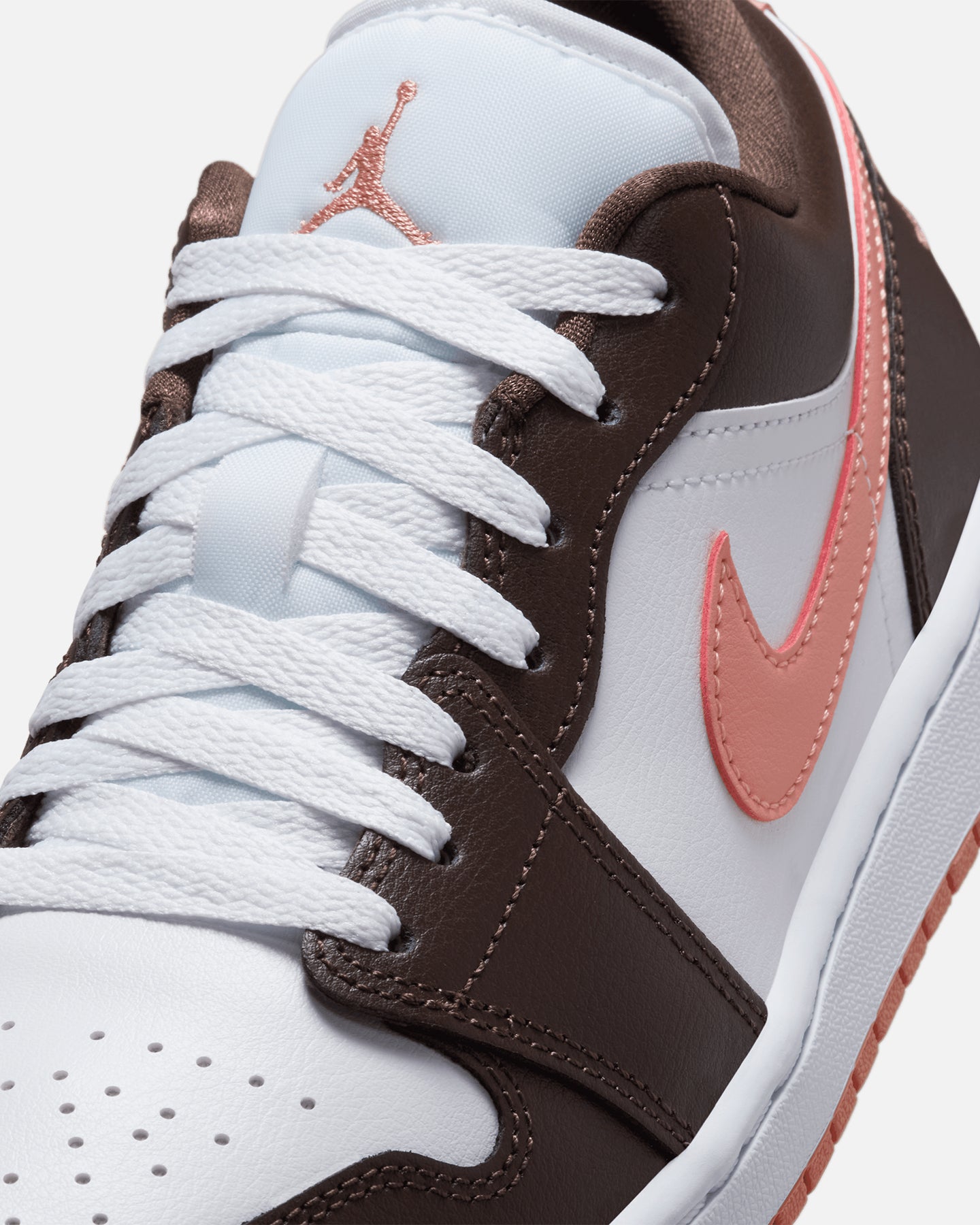 brown and pink jordans 1