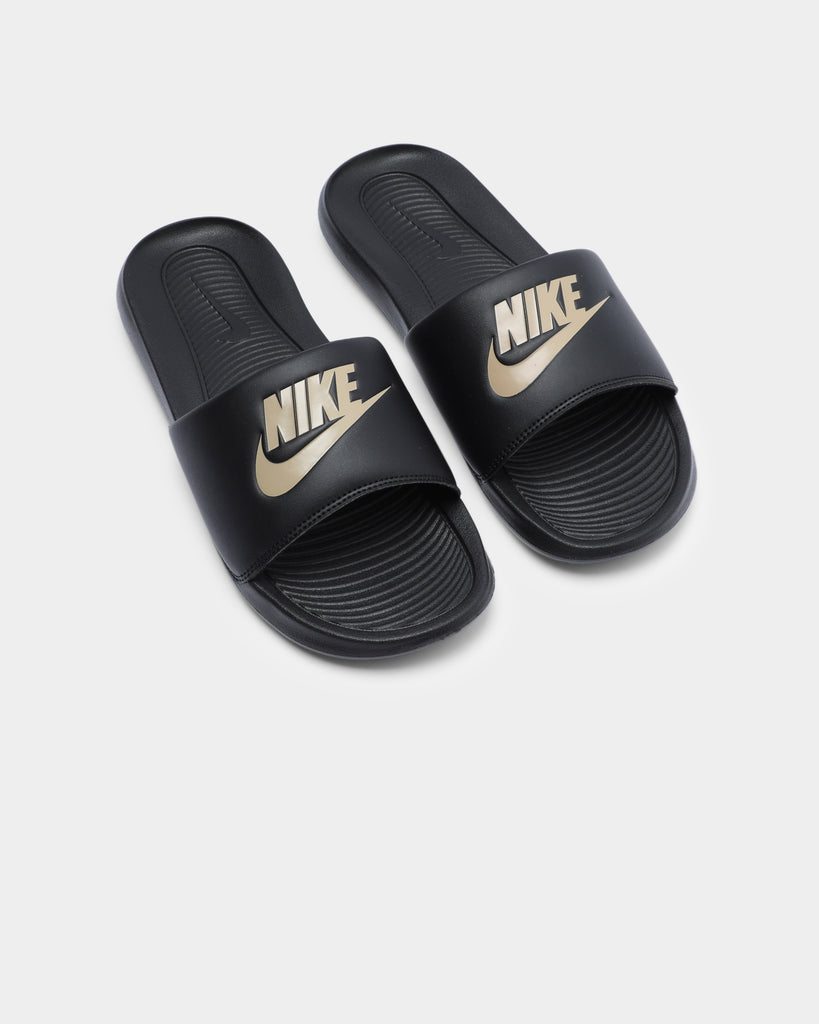 nike sliders with gold tick