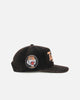 New Era Balmain Tigers 'NRL Golfer Washed Black' Pre-Curved Corduroy Golfer Snapback Washed Black