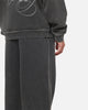 Mitchell & Ness Las Vegas Raiders Star Script Relaxed Track Pants Washed Black