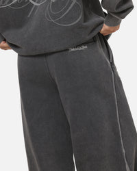 Mitchell & Ness Las Vegas Raiders Star Script Relaxed Track Pants Washed Black