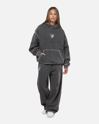 Mitchell & Ness Las Vegas Raiders Star Script Relaxed Track Pants Washed Black