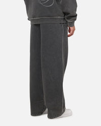 Mitchell & Ness Las Vegas Raiders Star Script Relaxed Track Pants Washed Black