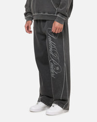 Mitchell & Ness Las Vegas Raiders Star Script Relaxed Track Pants Washed Black