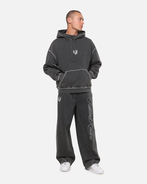 Mitchell & Ness Las Vegas Raiders Star Script Relaxed Track Pants Washed Black