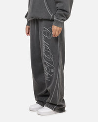 Mitchell & Ness Las Vegas Raiders Star Script Relaxed Track Pants Washed Black