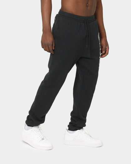 Mitchell & Ness Raiders Wordmark Sweat Pants Faded Black