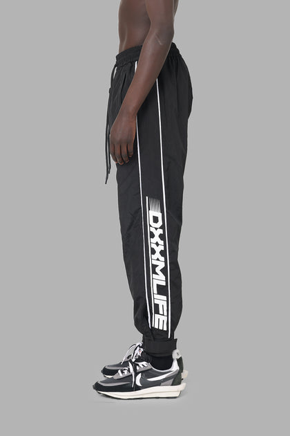 DXXMLife L-5 Nylxn Racing Trackpants Black