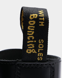 Dr. Martens Jadon 8 Eye Polish Smooth Black